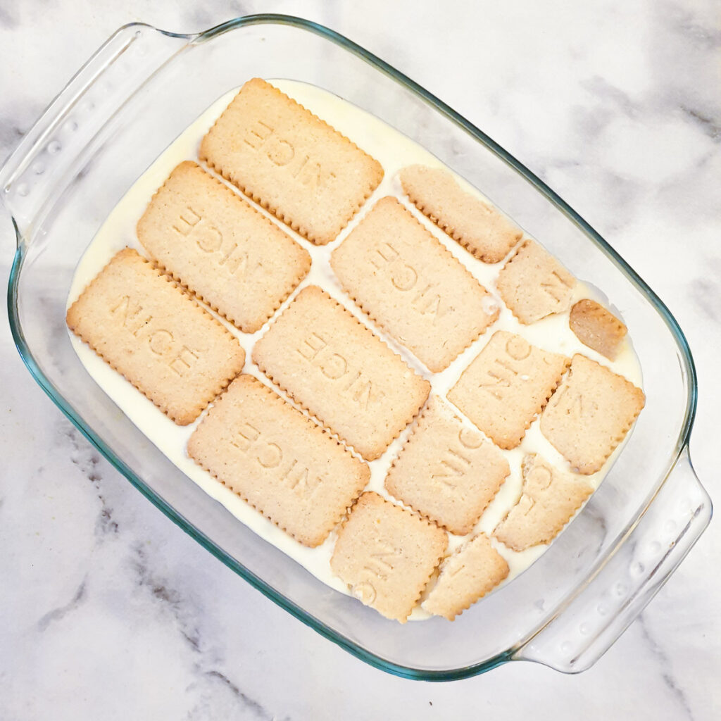 The second layer of biscuits on top of the yoghurt filling.