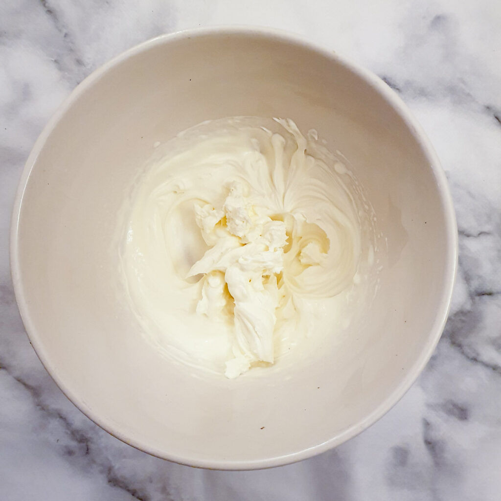 A bowl of whipped cream.