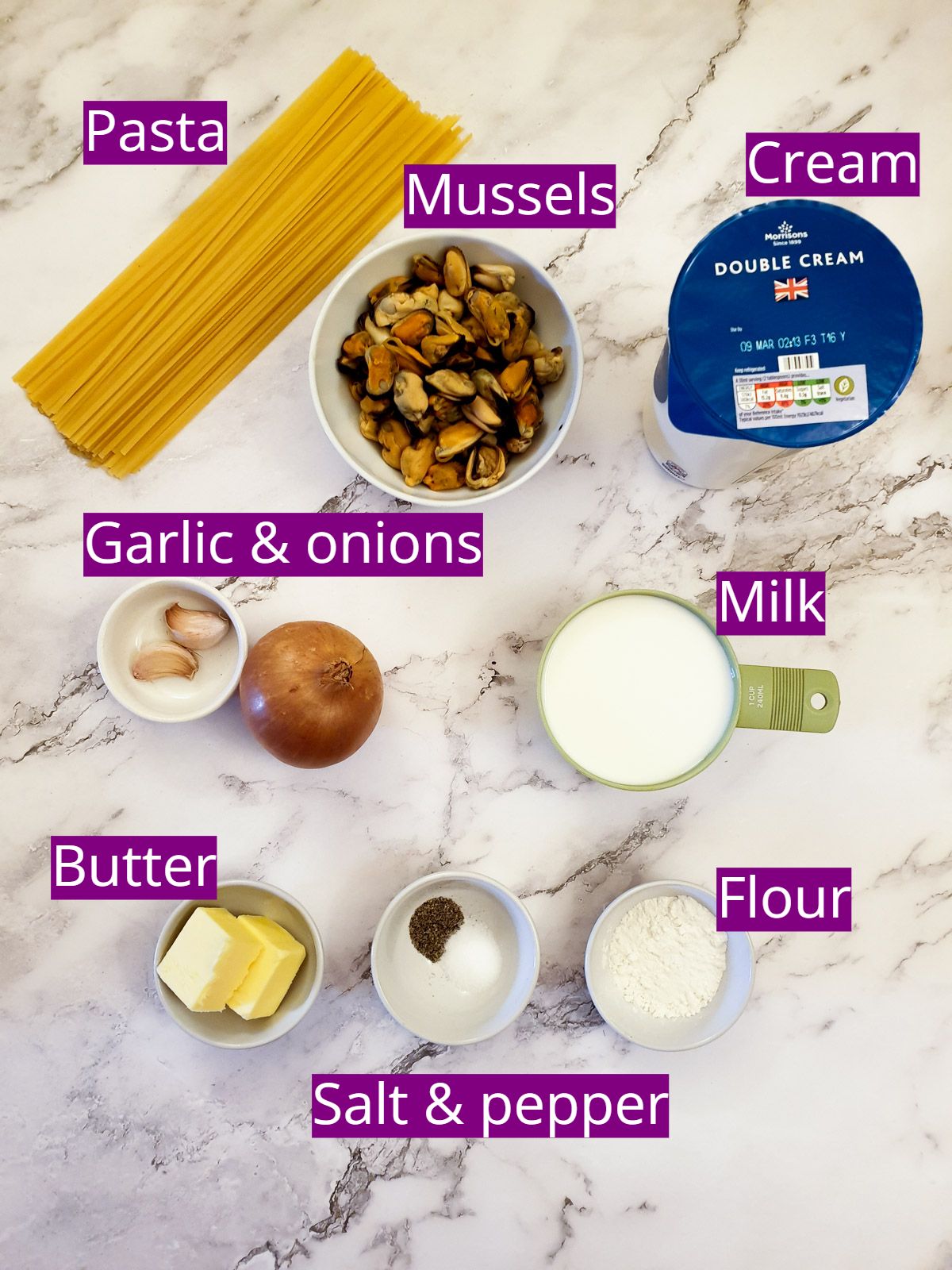 Ingredients for making creamy mussel pasta.