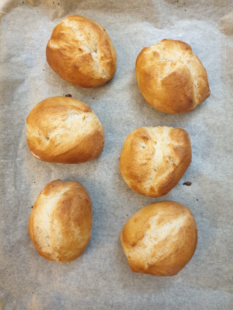 6 crusty German bread rolls fresh from the oven.