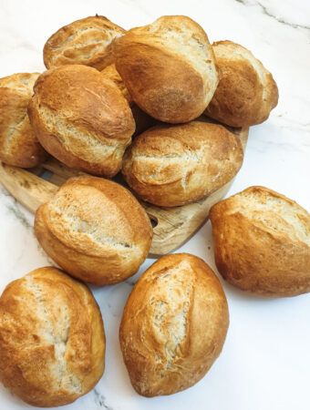 A pile of crusty German bread rolls.