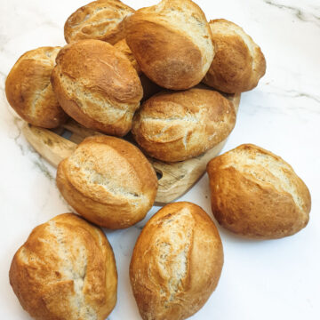 A pile of crusty German bread rolls.