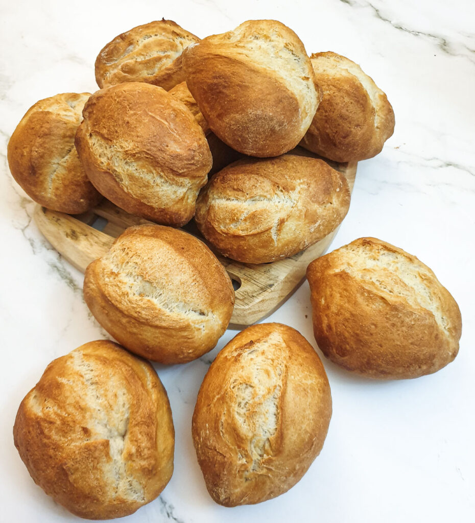 A pile of crusty German bread rolls.