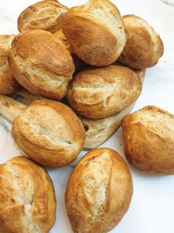 A pile of crusty German bread rolls.