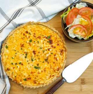 Overhead shot of a cheese and onion quiche.