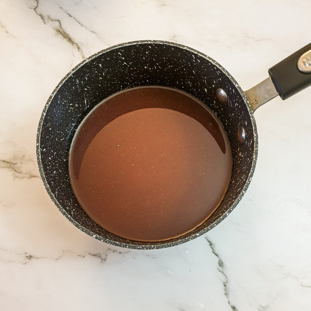 Barbeque sauce ingredients in a saucepan.