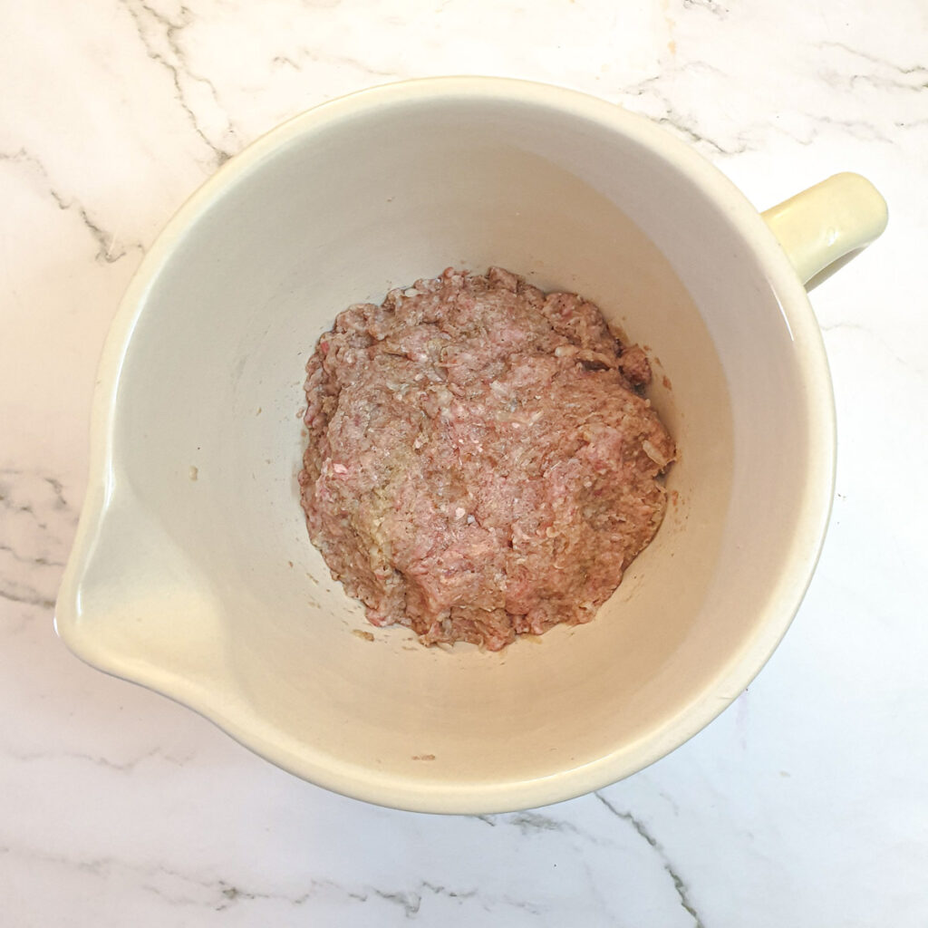 The meatball mixture ready for shaping into meatballs.