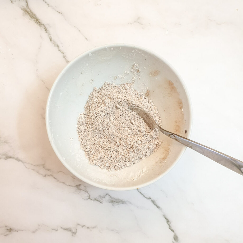 Sugar and cornflour in a small bowl.