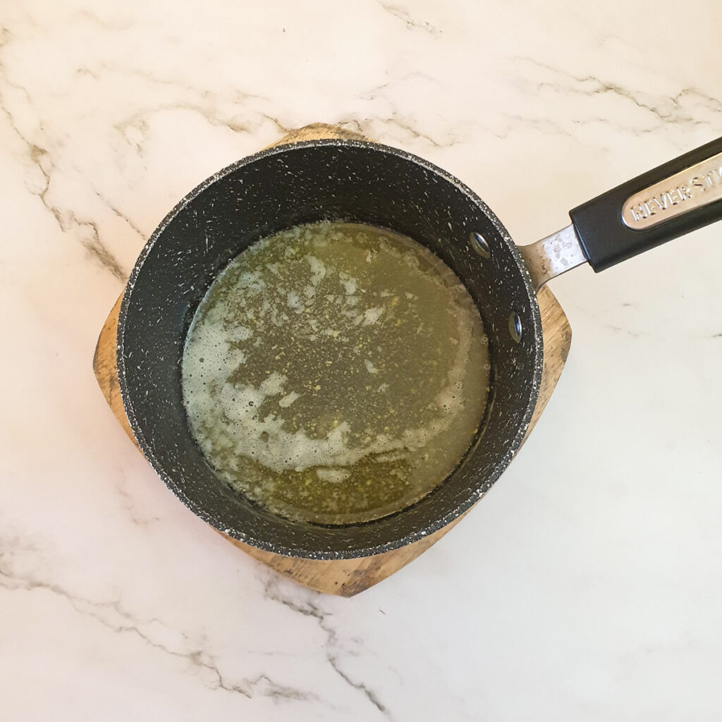 Butter melting in a saucepan.