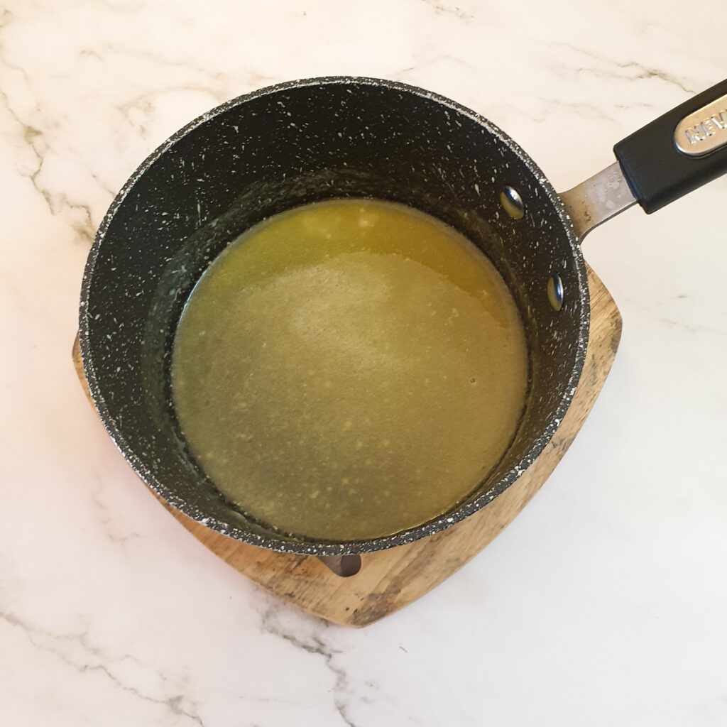 Melted butter and flour combined in a saucepan.