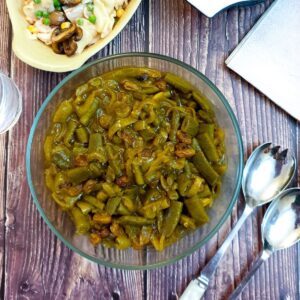 Overhead shot of a dish of curried green beans.