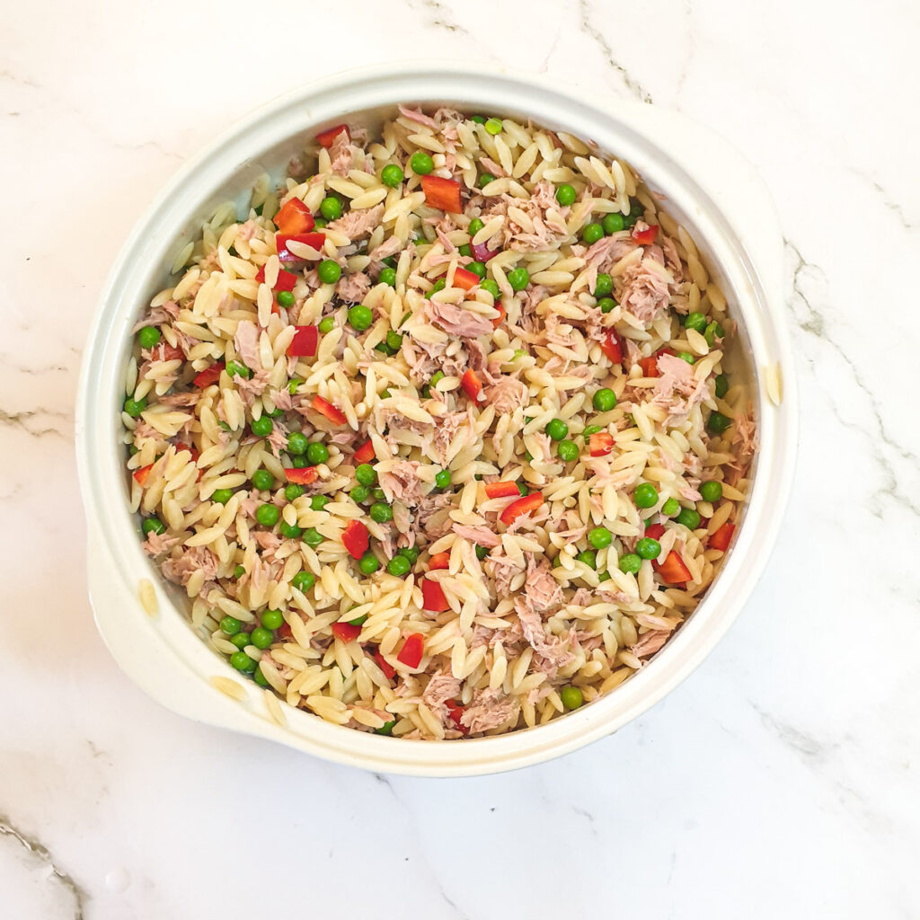 Tuna, red peppers and peas mixed with orzo pasta.