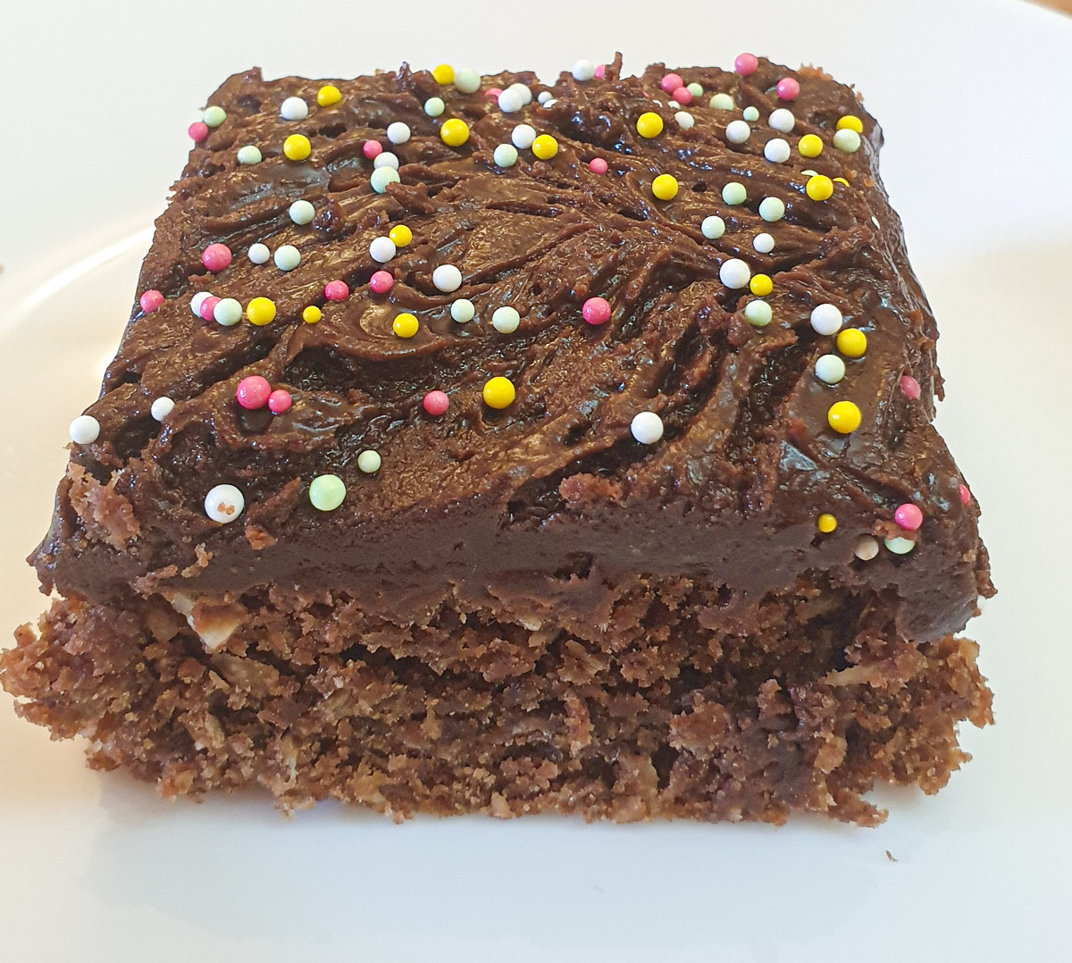 Closeup of a slice of weetabix cake showing the texture.