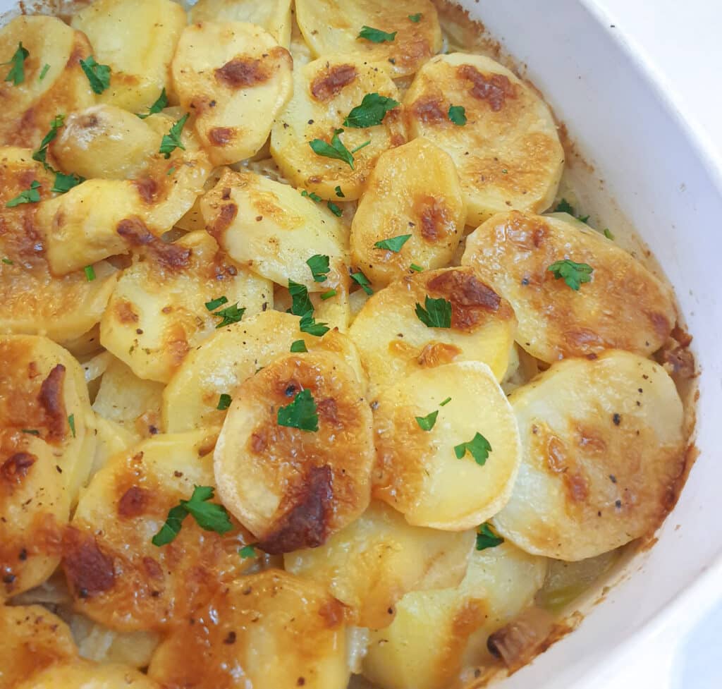 Closeup of a dish of potatoes boulangere.