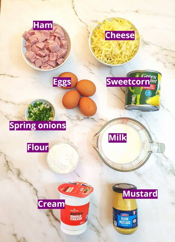 Ingredients for a ham and cheese quiche with sweetcorn.