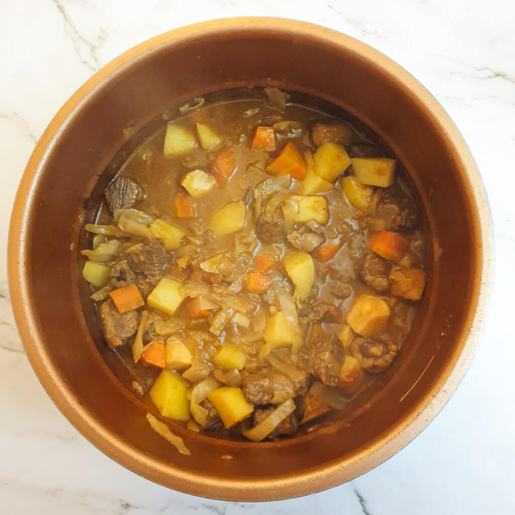 Filling for steak and kidney pie in a pressure cooker.