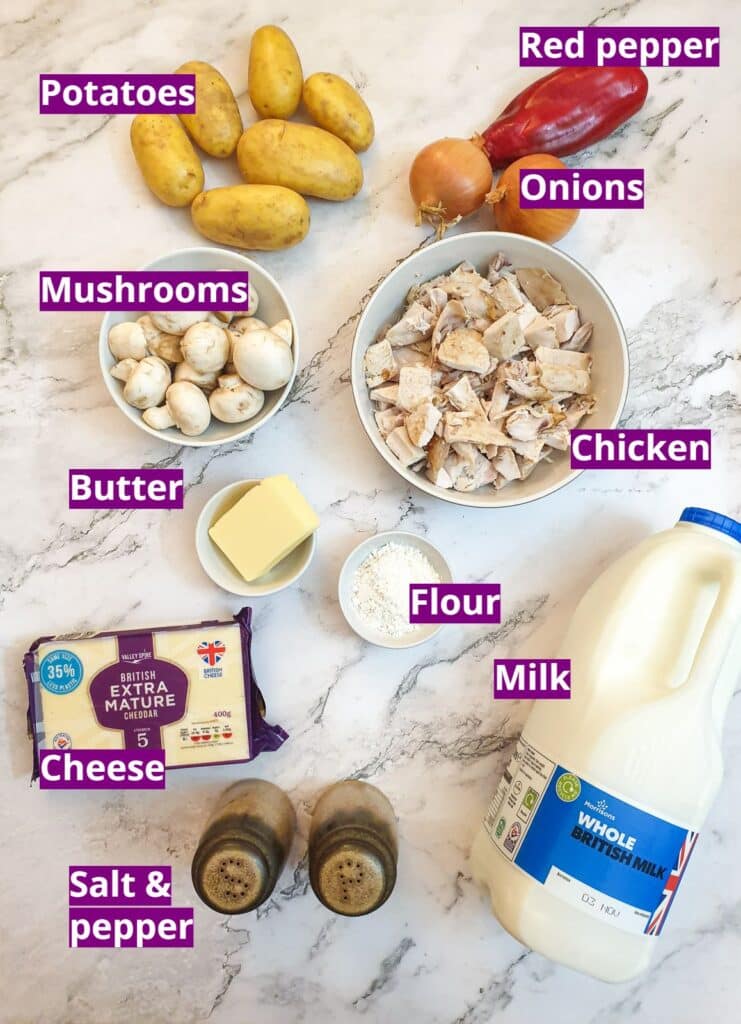 Ingredients for a cheesy chicken and potato bake.