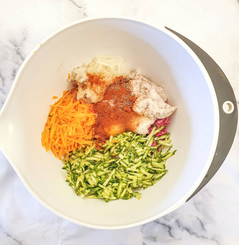 Meatloaf ingredients in a mixing bowl.