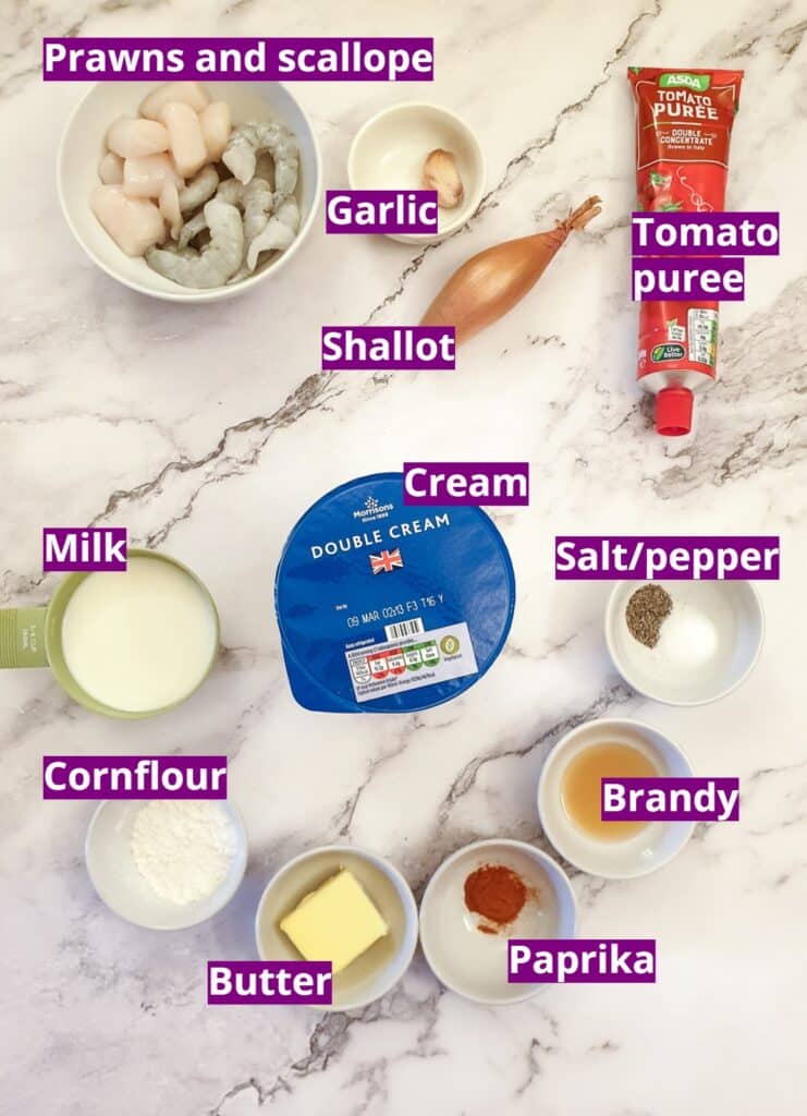 Ingredients for prawn and scallop au gratin. Ingredients for prawn and scallop au gratin.