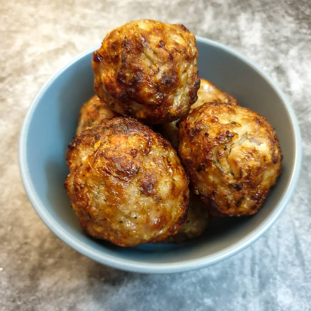 Close up of sage and onion stuffing balls.