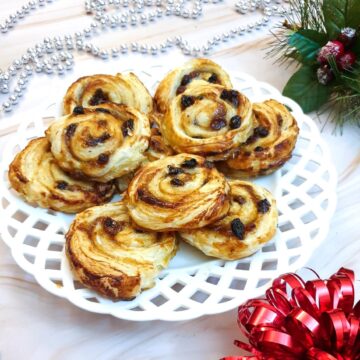 A plate of Christmas fruit pinwheels.