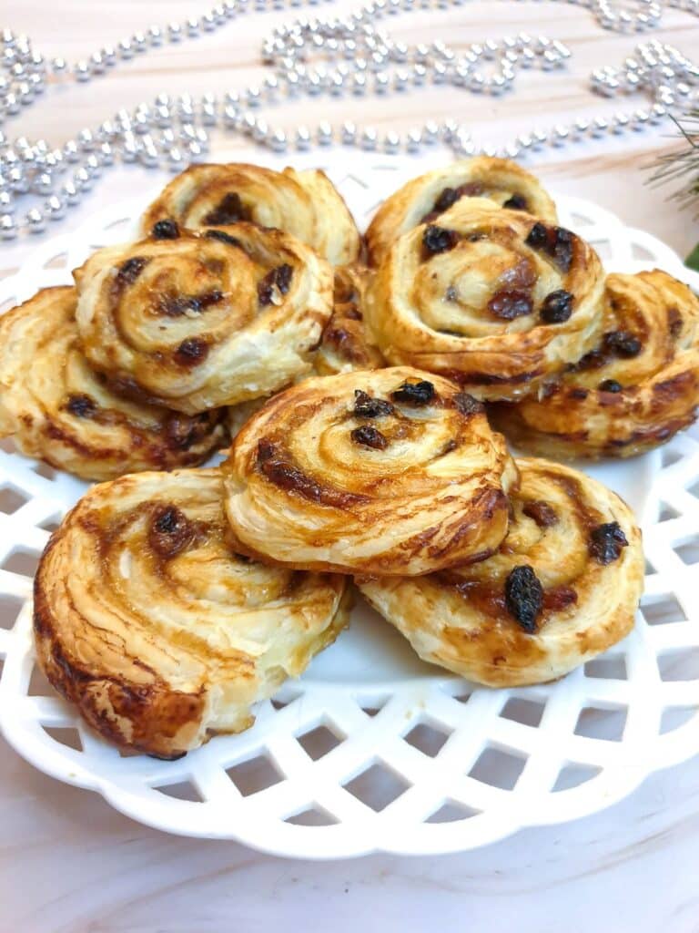 Close up of a plate of Christmas mince pinwheels.