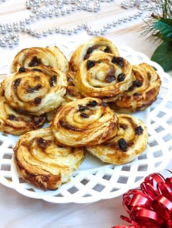 A plate of Christmas fruit pinwheels.