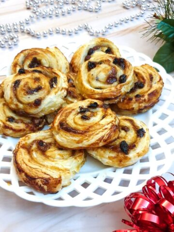 A plate of Christmas fruit pinwheels.