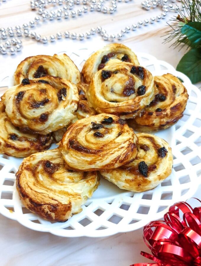 A plate of Christmas fruit pinwheels.