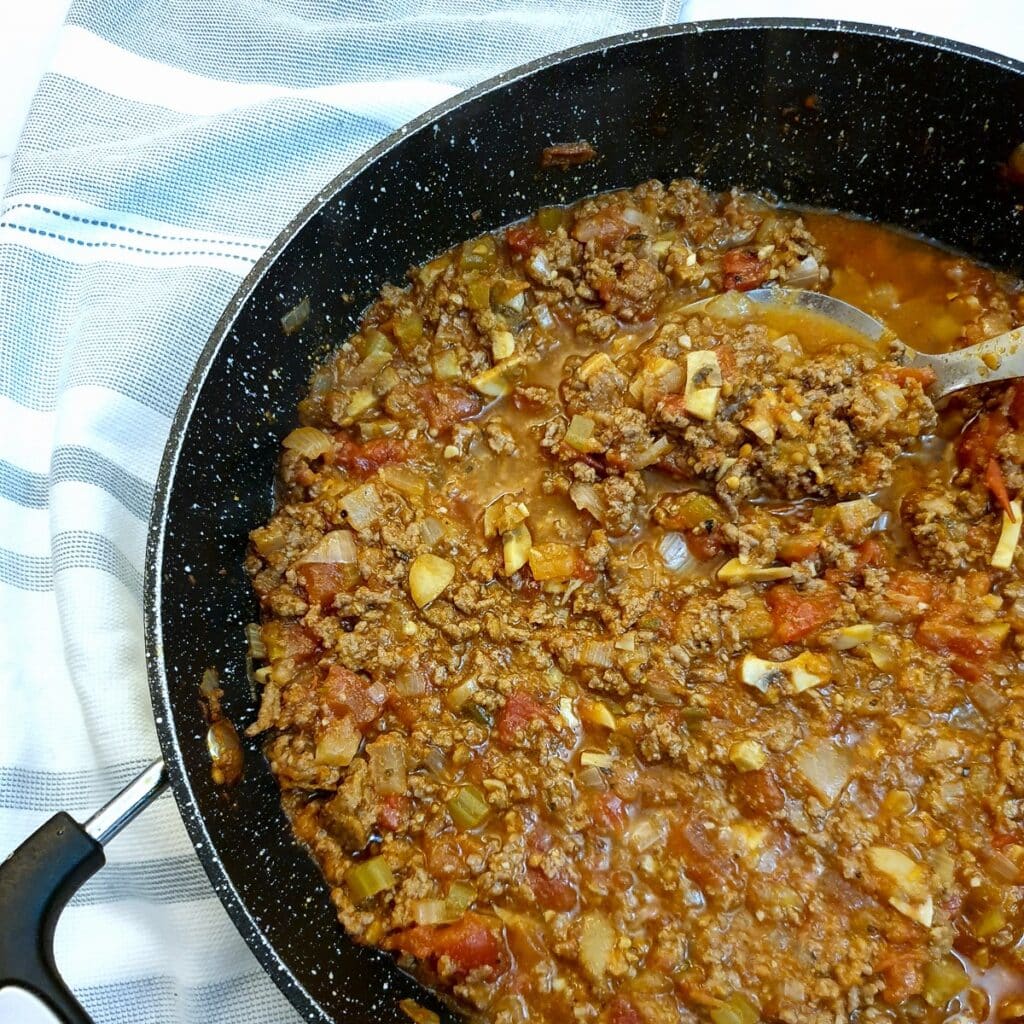 A pan of bolognese sauce ready for serving.