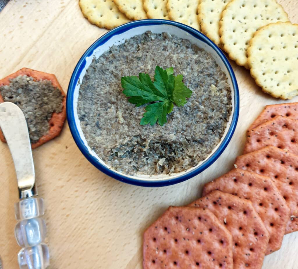 Close up of a bowl of mushroom pate showing the texture.