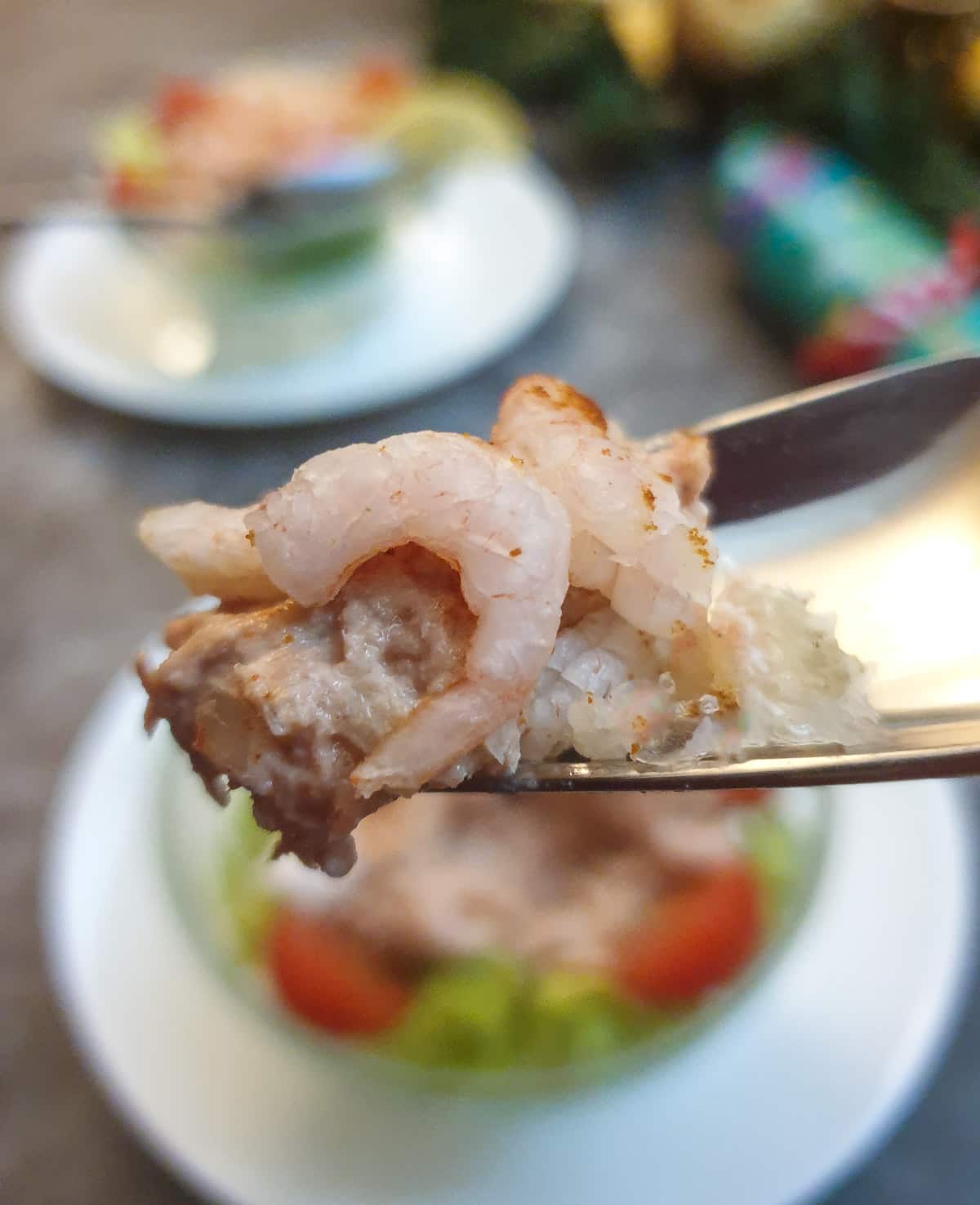 Close up of poor man's crayfish on a fork.