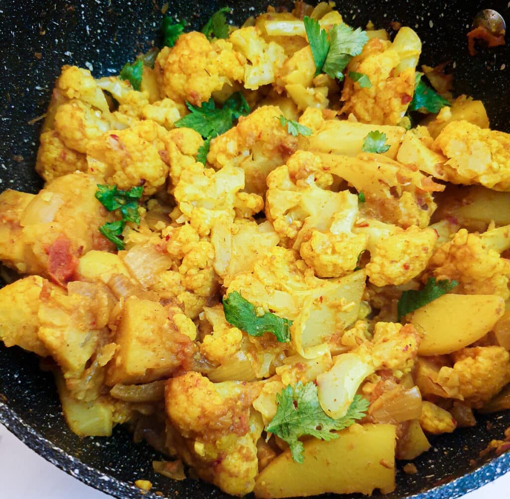 Closeup of a dish of aloo gobil.