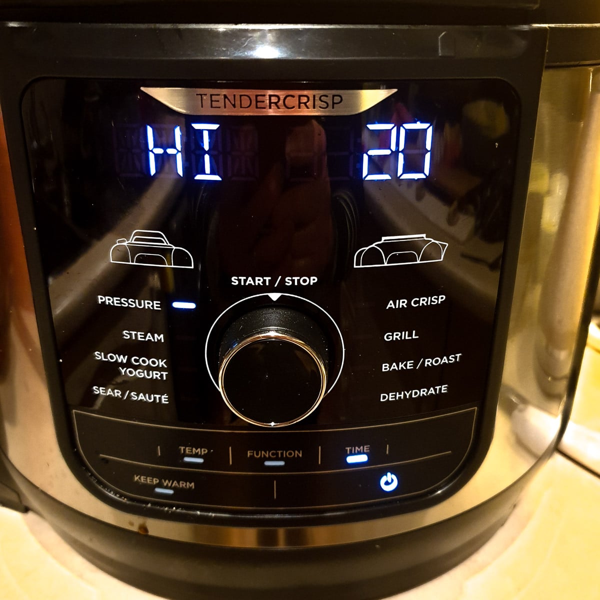 The front of a Ninja pressure cooker showing the pressure setting.