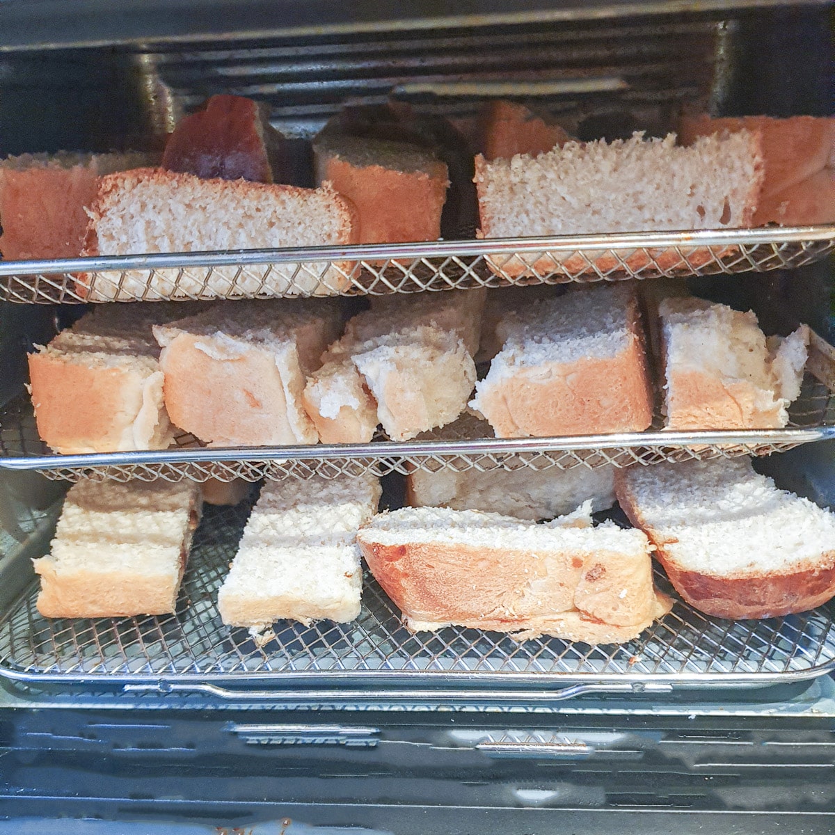 Sliced rusks in a dehydrator.