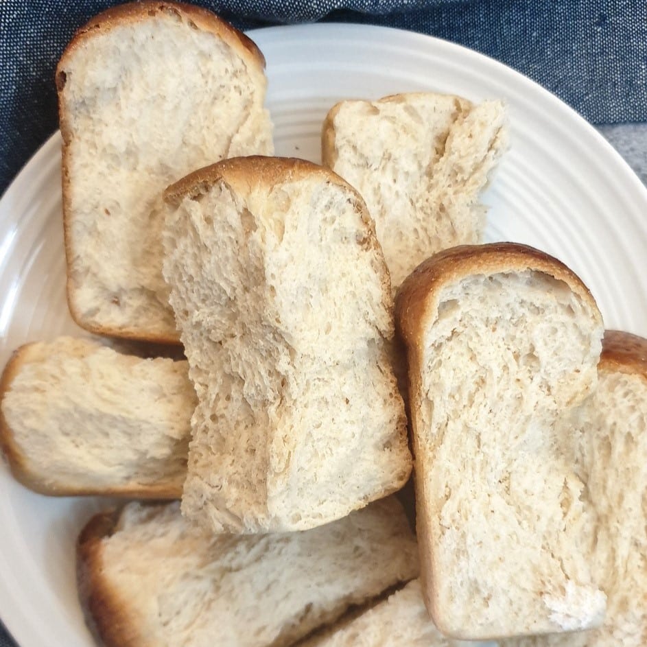 A close up of dried condensed milk rusks on a plate.