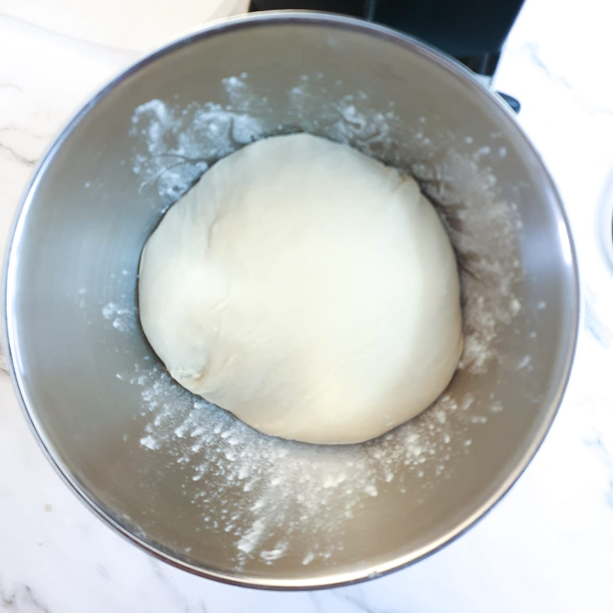 A ball of dough before it has risen.