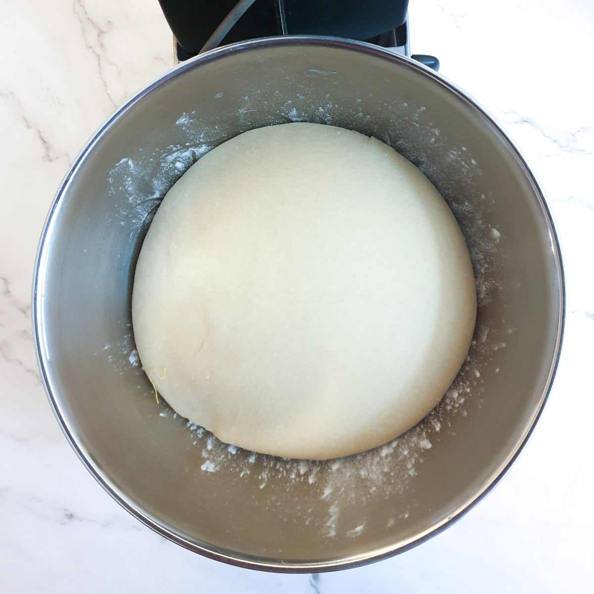 A ball of dough after it has risen and doubled in size.