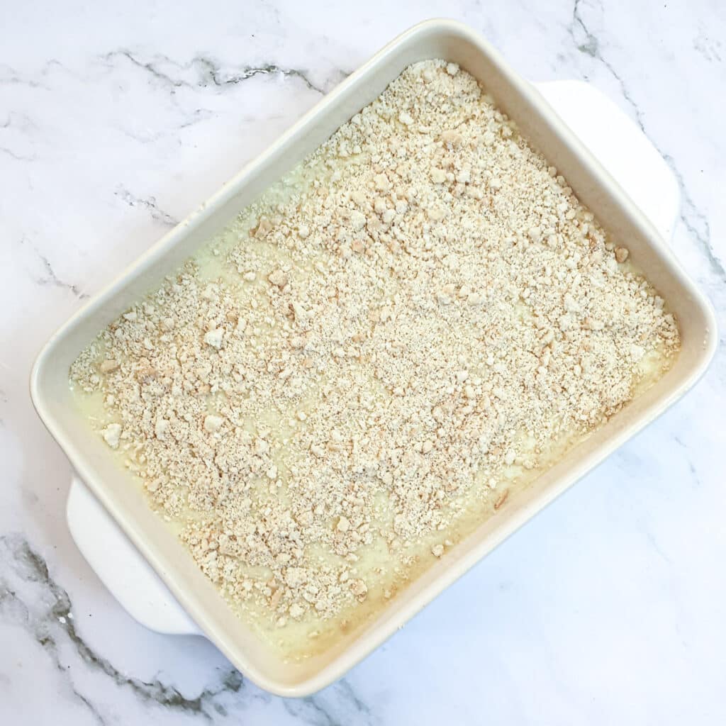 The finished pineapple fridge cake covered with biscuit crumbs.