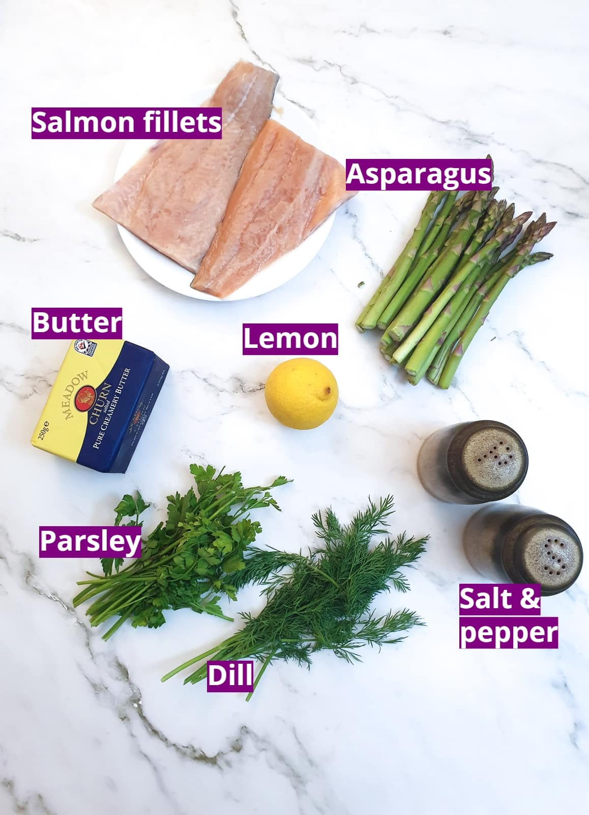Ingredients for making salmon and asparagus parcels.