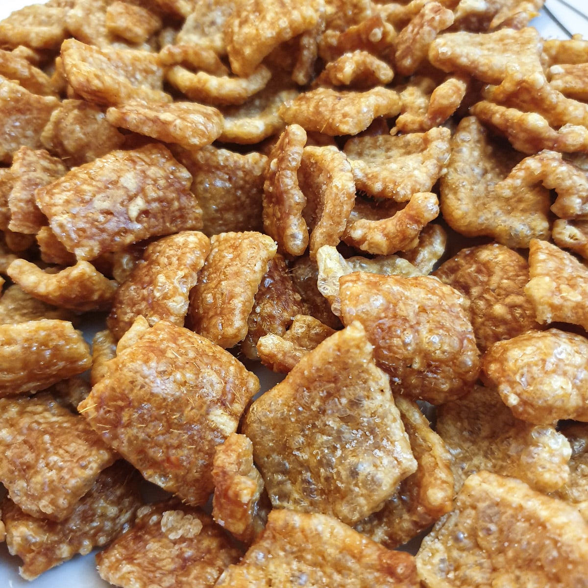 Close up of crispy pork scratchings