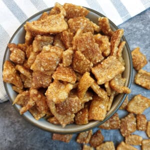 Overhead shot of a dish of crispy pork scratchings.