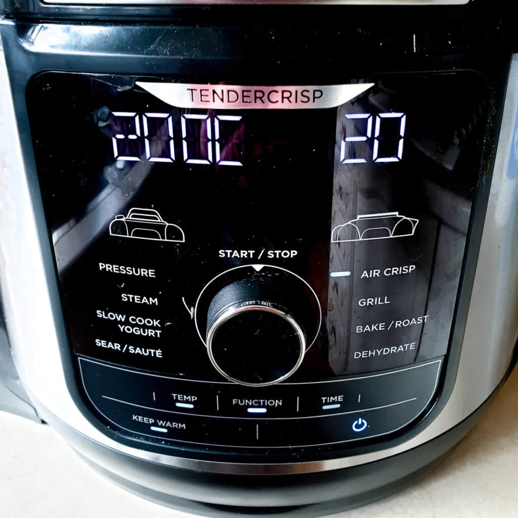 A Ninja multi-cooker showing the settings for cooking pork scratchings.