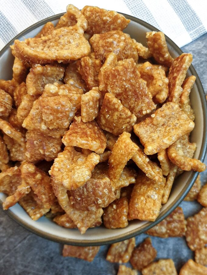 Overhead shot of a dish of crispy pork scratchings.