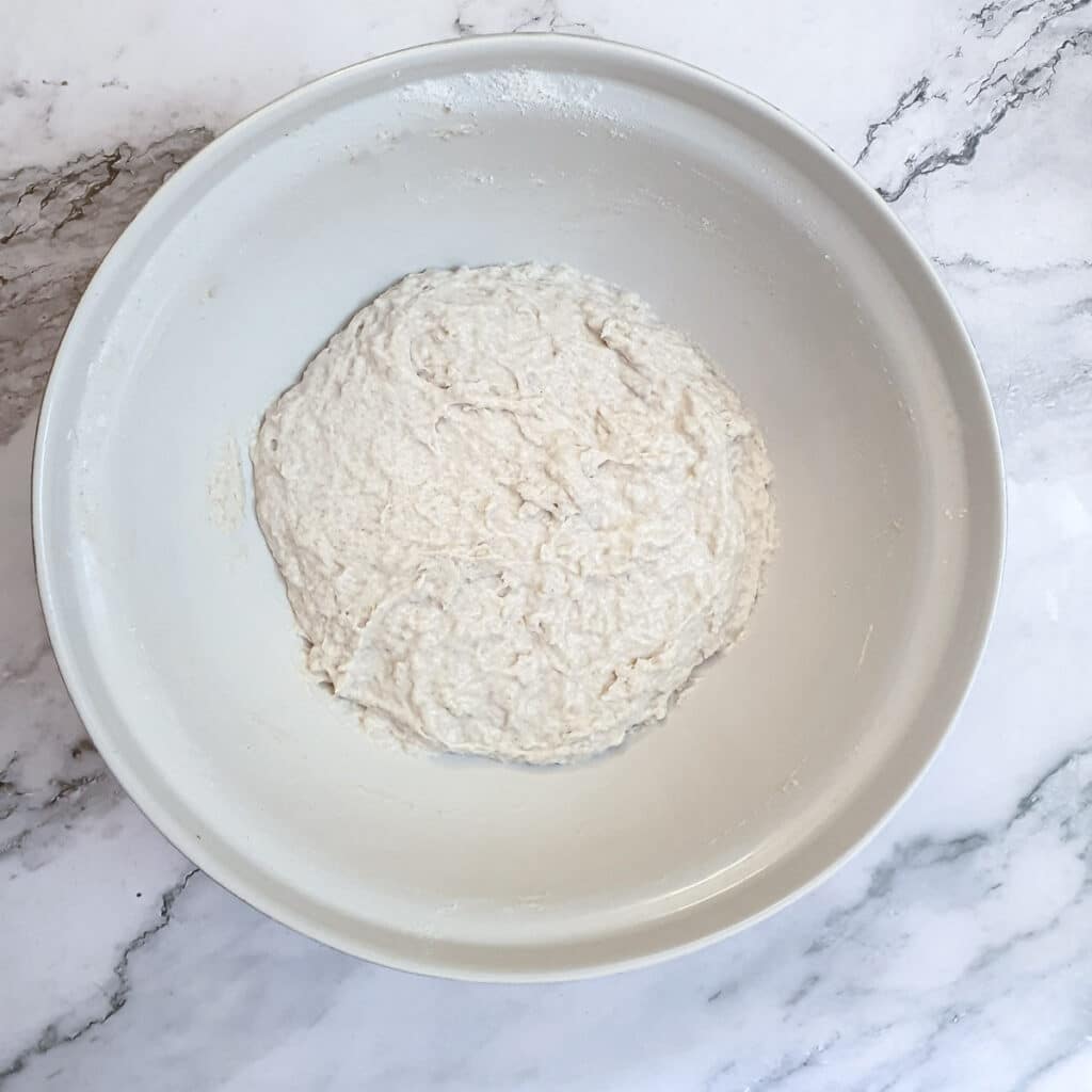 A ball of dough for a cheese and onion loaf before it has risen.