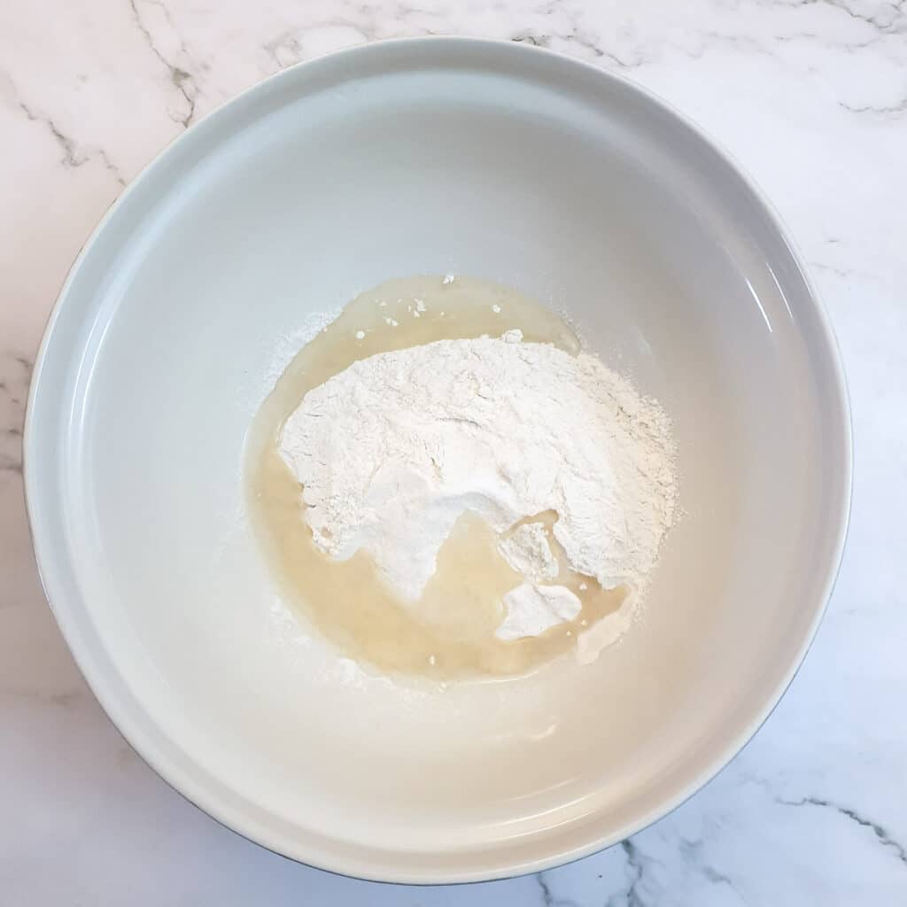 Flour and salt in a large mixing bowl.