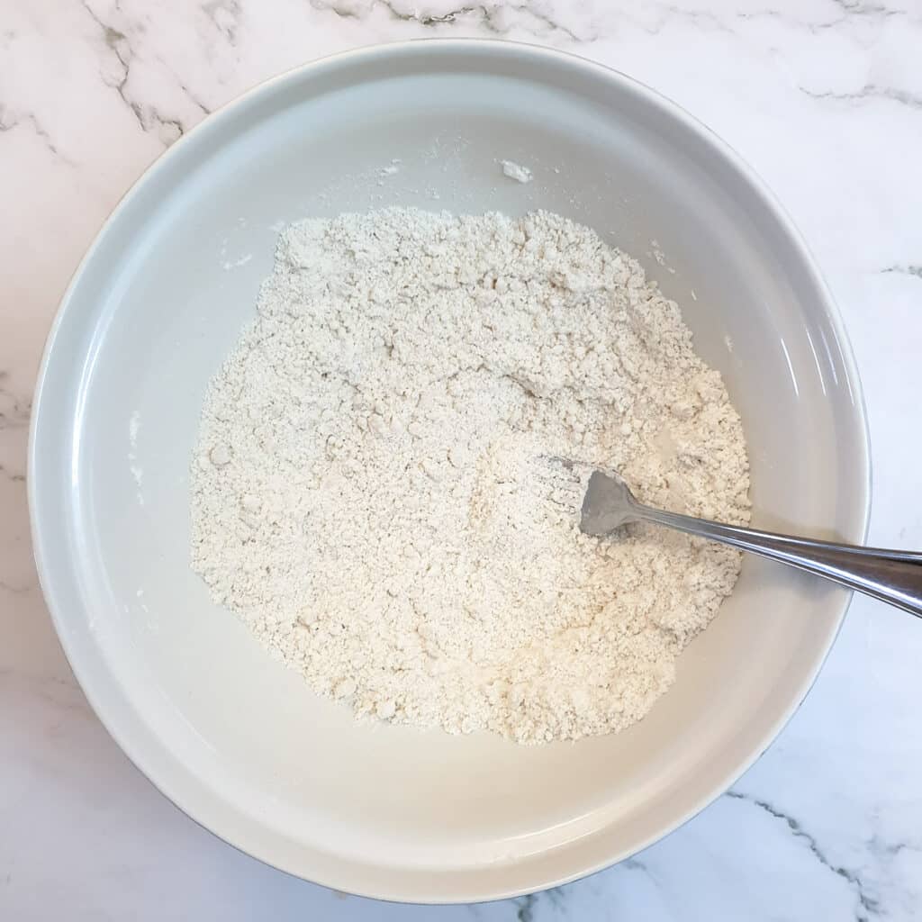 Flour mixed with oil to form 'breadcrumbs'.