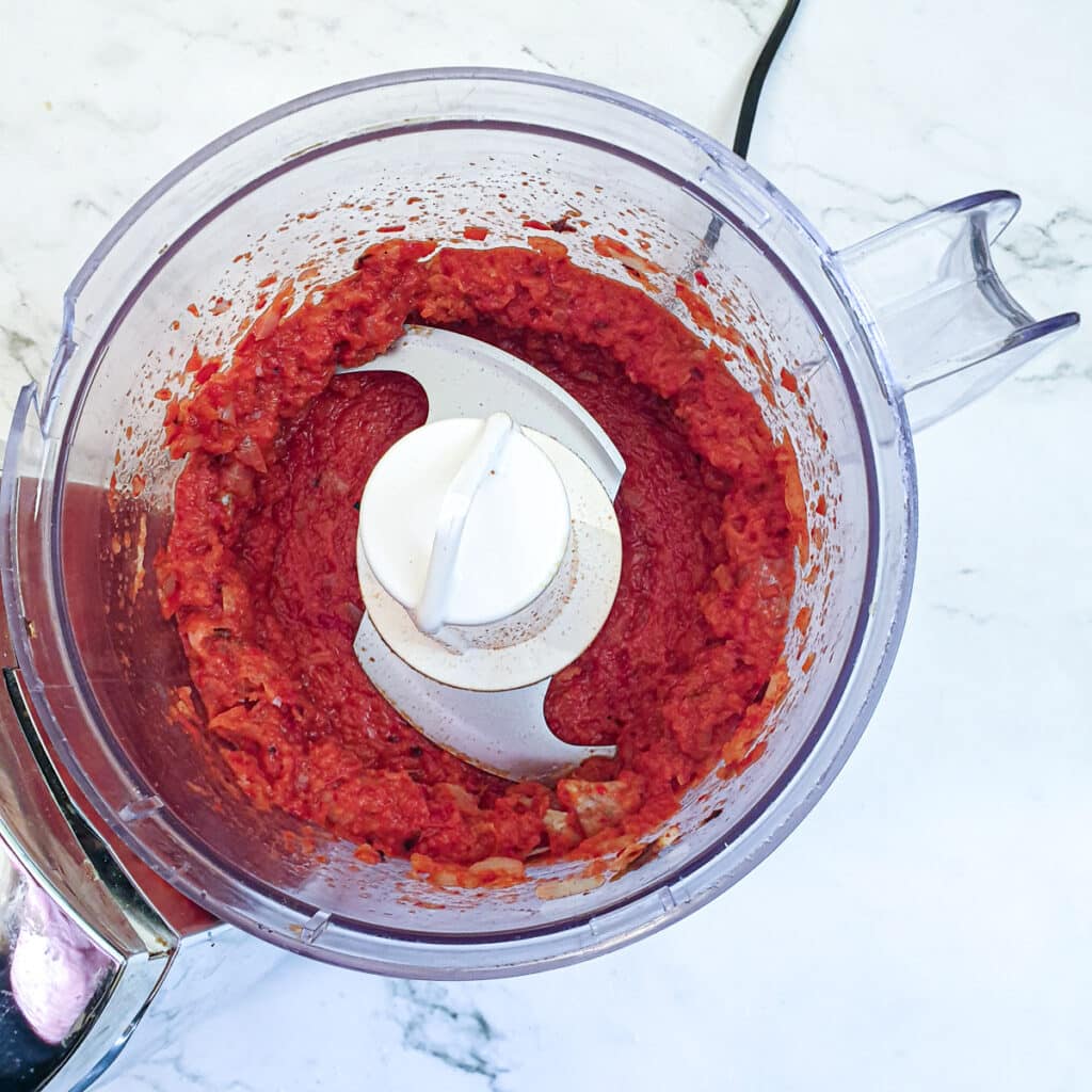 Red pepper and onion blended to a paste in a food processor.