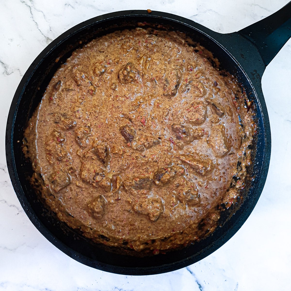 The completed dish of chicken livers, with the addition of cream.