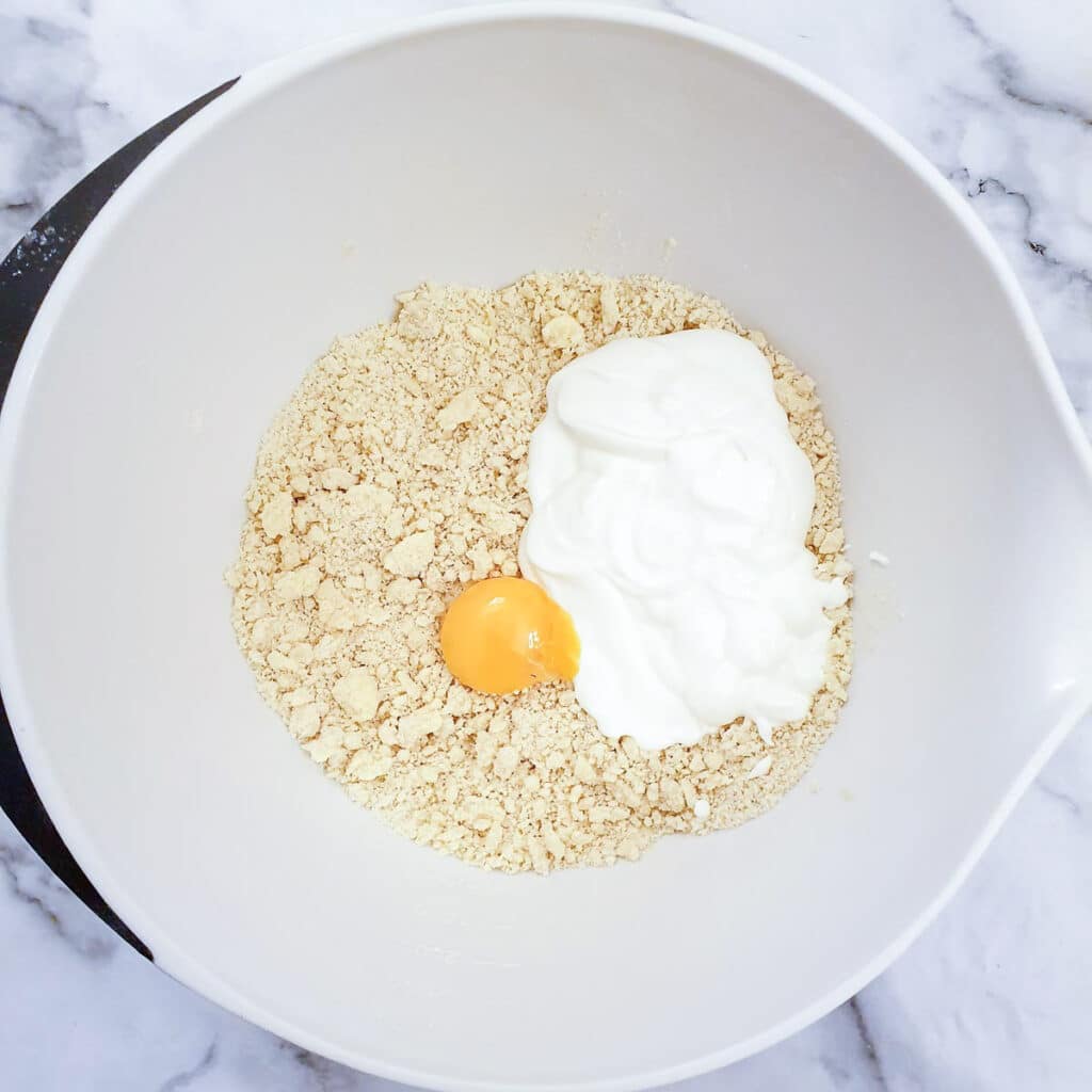 Egg yolk and yoghurt added to flour and butter breadcrumbs.